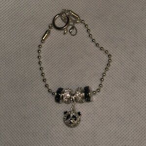 Panda charm bracelet silver toned with silver and black gems.